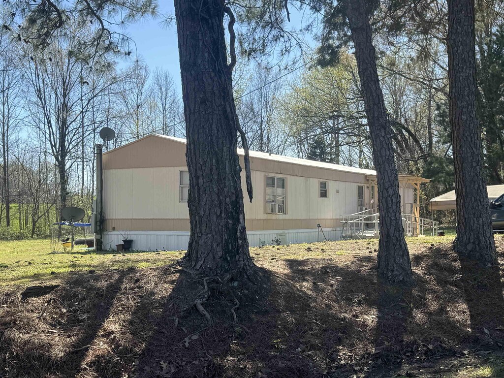 5137 Old Brownsville Rd, Ripley, TN 38063 - view of property exterior featuring cooling unit