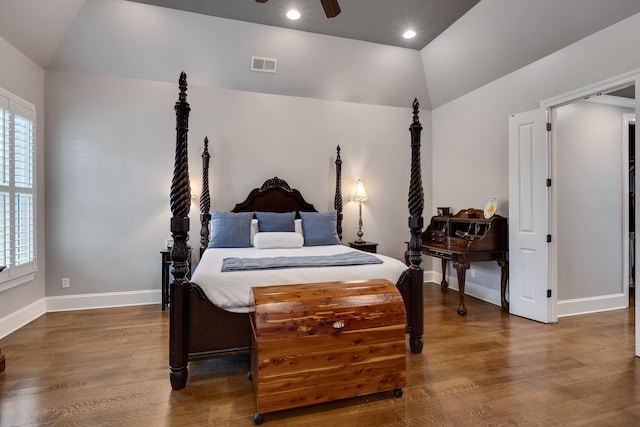 bedroom with dark wood finished floors, lofted ceiling, baseboards, recessed lighting, and ceiling fan