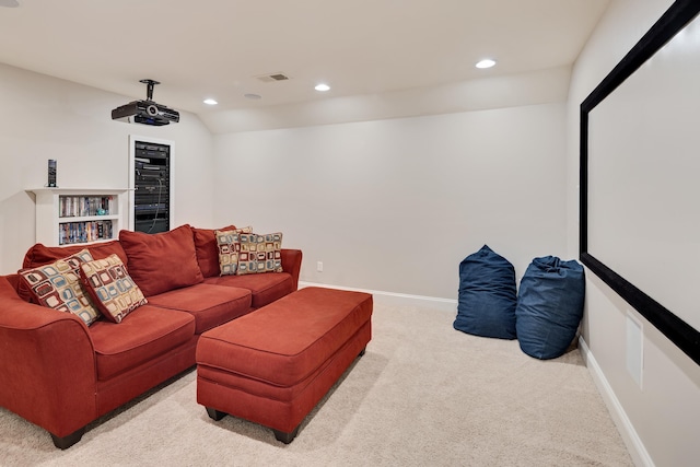 cinema room with carpet floors, recessed lighting, and baseboards