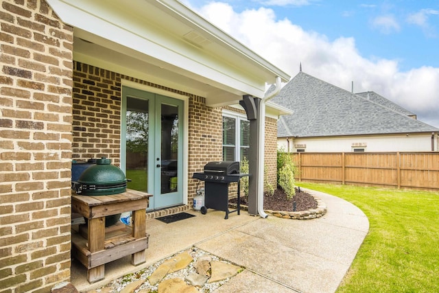 view of patio featuring french doors and grilling area