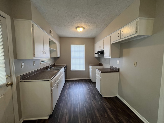 4034 Edgehill St, Memphis, TN 38128 - kitchen featuring a sink, a textured ceiling, white cabinetry, baseboards, and dark countertops