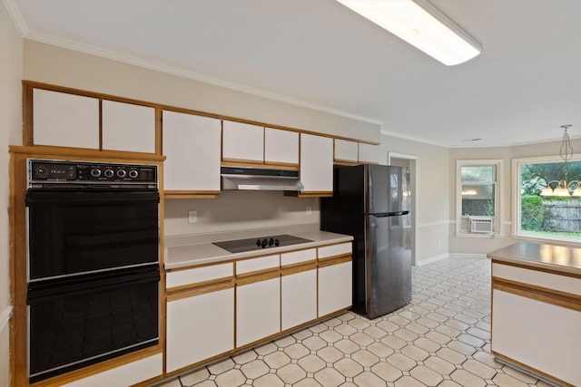 kitchen featuring black appliances, under cabinet range hood, light countertops, white cabinetry, and crown molding