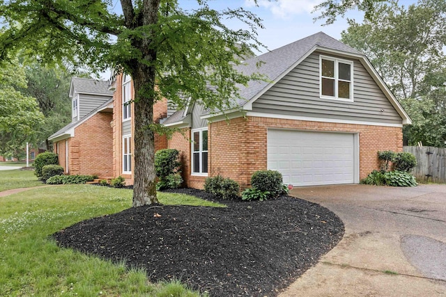 view of front of home featuring brick siding, concrete driveway, a garage, and a shingled roof