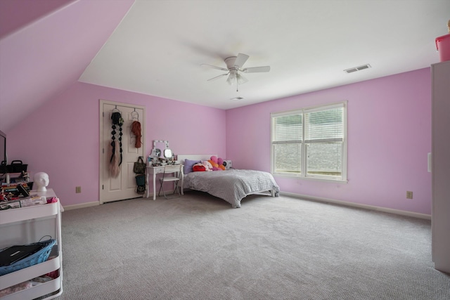 carpeted bedroom featuring baseboards, ceiling fan, and vaulted ceiling