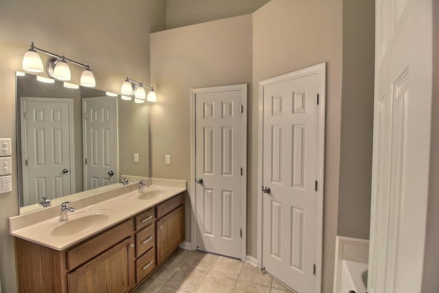 1354 E Island Pl, Memphis, TN 38103 - full bathroom with tile patterned flooring, double vanity, and a towering ceiling