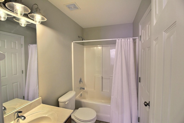 1354 E Island Pl, Memphis, TN 38103 - full bathroom featuring toilet, vanity, and shower / bathtub combination with curtain