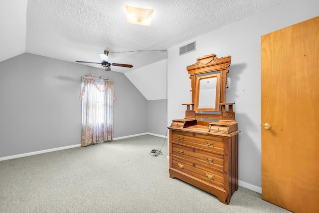 6196 Ivanhoe Cv, Bartlett, TN 38134 - bonus room with vaulted ceiling, a textured ceiling, a ceiling fan, carpet floors, and baseboards