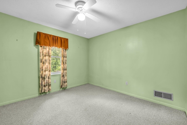 6196 Ivanhoe Cv, Bartlett, TN 38134 - empty room featuring a ceiling fan, carpet floors, baseboards, and a textured ceiling
