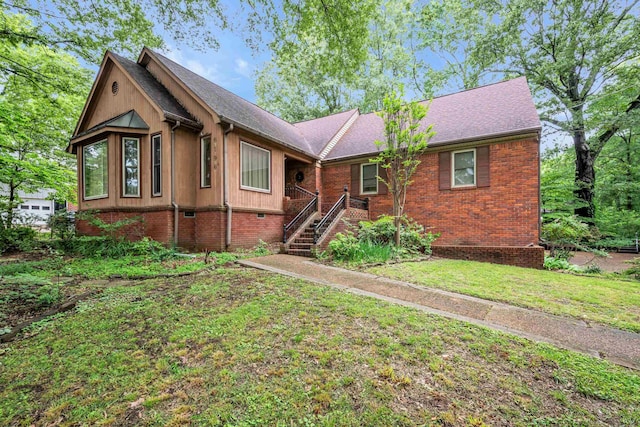 6196 Ivanhoe Cv, Bartlett, TN 38134 - ranch-style home with a front yard, brick siding, and roof with shingles