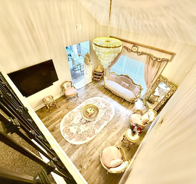 1210 Sanbyrn Dr, Cordova, TN 38018 - living room with a chandelier and wood finished floors