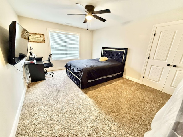 1210 Sanbyrn Dr, Cordova, TN 38018 - carpeted bedroom with baseboards and ceiling fan