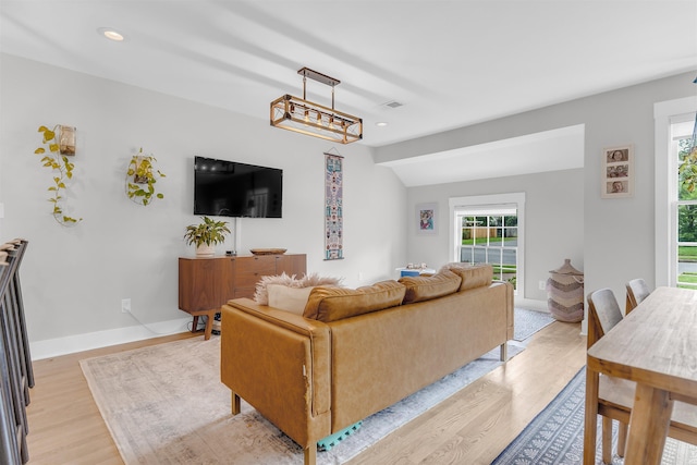 185 Alexander St, Memphis, TN 38111 - living room with light wood finished floors, a chandelier, recessed lighting, baseboards, and lofted ceiling