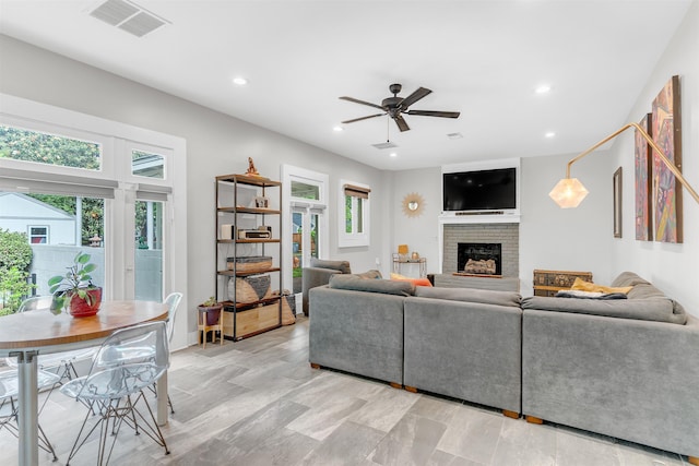 185 Alexander St, Memphis, TN 38111 - living area with ceiling fan, healthy amount of natural light, a fireplace, and recessed lighting