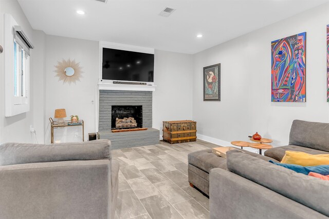 185 Alexander St, Memphis, TN 38111 - living area with recessed lighting, a fireplace, and baseboards