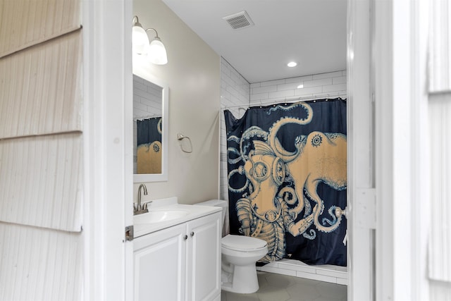 185 Alexander St, Memphis, TN 38111 - full bathroom featuring tile patterned floors, vanity, toilet, recessed lighting, and a shower with shower curtain