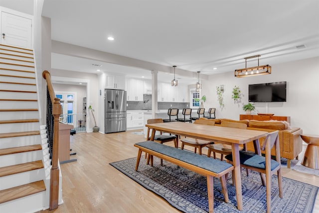 185 Alexander St, Memphis, TN 38111 - dining area with stairs, light wood-type flooring, and recessed lighting