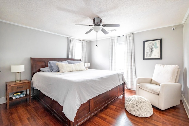 bedroom featuring wood finished floors, a textured ceiling, ceiling fan, and crown molding