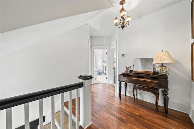1751 Carr Ave, Memphis, TN 38104 - hall with a chandelier, dark wood-style floors, ornamental molding, and baseboards