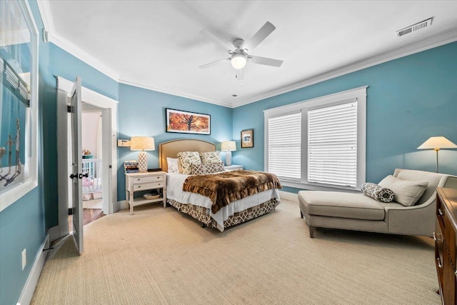 1751 Carr Ave, Memphis, TN 38104 - carpeted bedroom with crown molding, baseboards, and a ceiling fan
