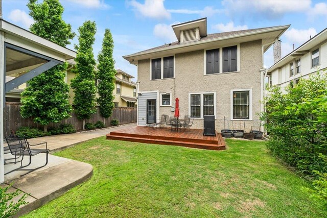 1751 Carr Ave, Memphis, TN 38104 - back of house featuring a wooden deck, stucco siding, and central air condition unit