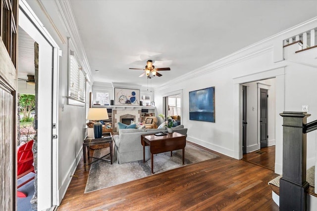 1751 Carr Ave, Memphis, TN 38104 - living area with ceiling fan, wood finished floors, baseboards, ornamental molding, and a fireplace