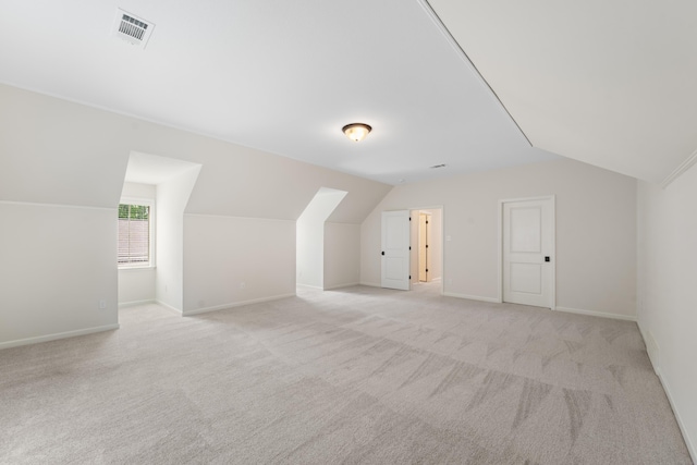 940 Cypress Vine Cv, Collierville, TN 38017 - bonus room featuring vaulted ceiling, light colored carpet, and baseboards