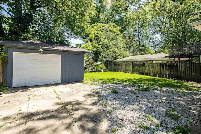 236 N Willett St, Memphis, TN 38112 - view of yard with driveway, an outdoor structure, and a detached garage