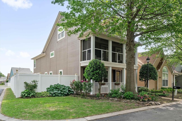 112 Isle Creek Dr, Memphis, TN 38103 - view of home's exterior with covered porch and a sunroom