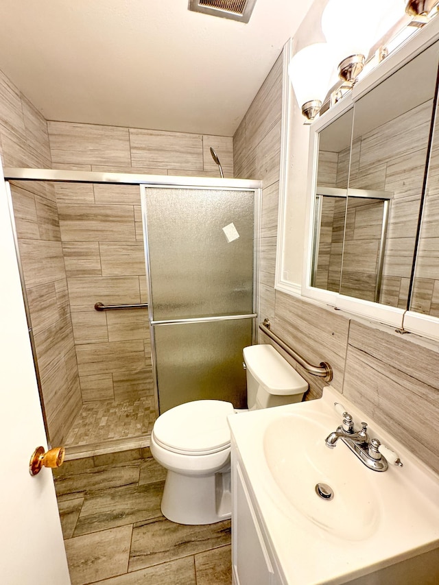 4486 Mayo Ave, Memphis, TN 38128 - full bath with toilet, a tile shower, and vanity