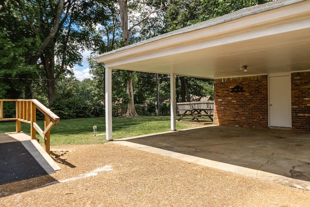 4486 Mayo Ave, Memphis, TN 38128 - view of patio featuring a carport