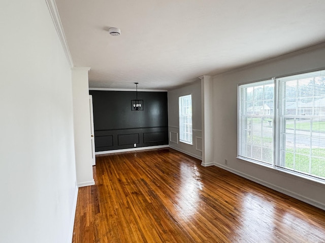 4486 Mayo Ave, Memphis, TN 38128 - unfurnished room featuring ornamental molding, wood finished floors, a chandelier, a smoke detector, and baseboards