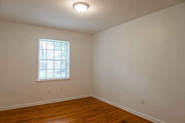 4486 Mayo Ave, Memphis, TN 38128 - spare room featuring baseboards and wood finished floors