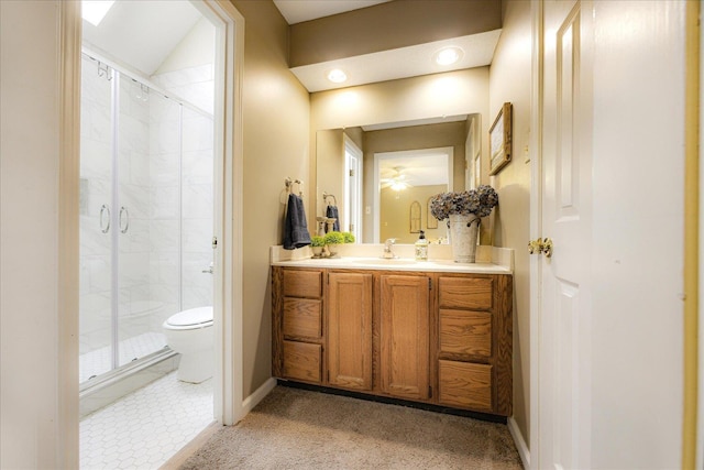 8570 W Park Trail Dr, Germantown, TN 38139 - full bathroom featuring toilet, a shower stall, vanity, and baseboards
