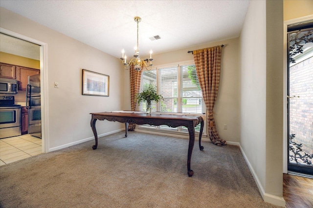 8570 W Park Trail Dr, Germantown, TN 38139 - dining area with a chandelier, light carpet, and baseboards