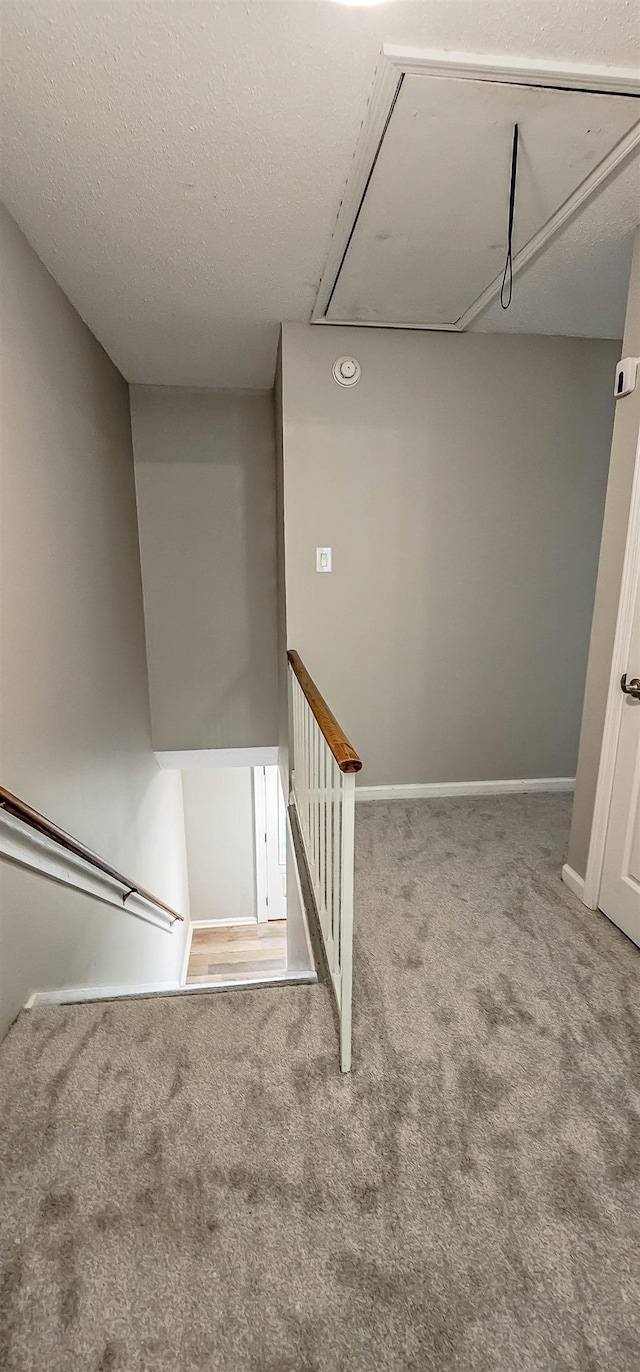 1731 Hobbits Glen Dr Unit 14, Germantown, TN 38138 - staircase featuring attic access, carpet, and baseboards