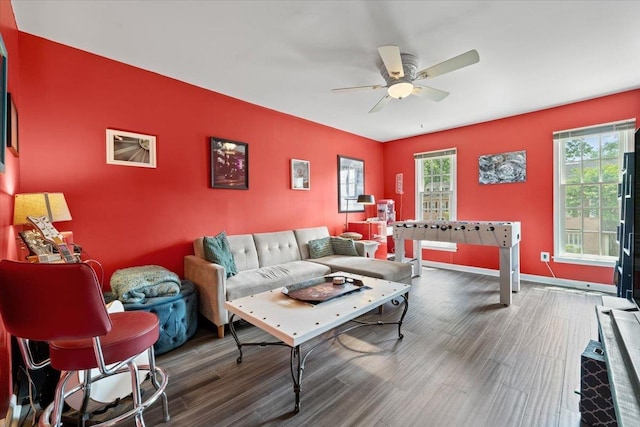 2268 Tunis Cv Unit 2268, Memphis, TN 38104 - living area featuring a ceiling fan, wood finished floors, an accent wall, and baseboards