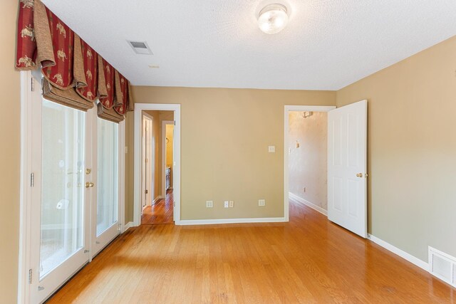 7475 Willey Rd, Germantown, TN 38138 - spare room featuring light wood-style flooring and baseboards