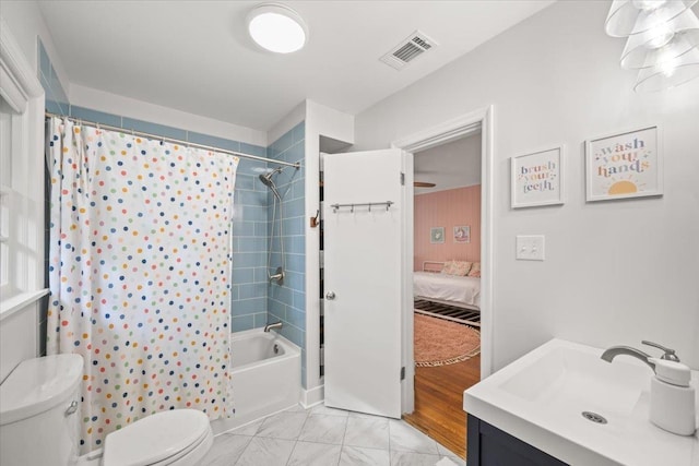 4539 Kings Park Rd, Memphis, TN 38117 - ensuite bathroom featuring toilet, shower / bathtub combination with curtain, vanity, and marble look tiles