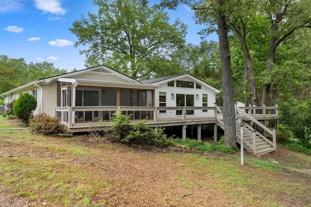 975 Buchanan Peninsula St, Cherokee, AL 35616 - rear view of house featuring a sunroom, a deck, and stairs
