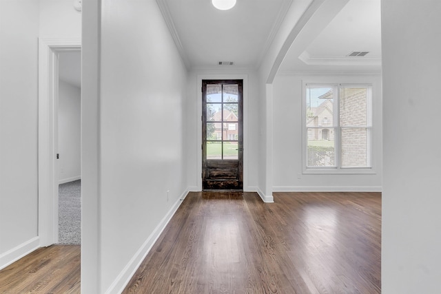 1235 Gimel Ln, Cordova, TN 38016 - foyer entrance with ornamental molding, dark wood finished floors, baseboards, and arched walkways