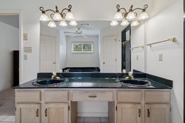 3187 Valley Lake Dr, Bartlett, TN 38135 - full bathroom with ceiling fan, double vanity, and tile patterned flooring