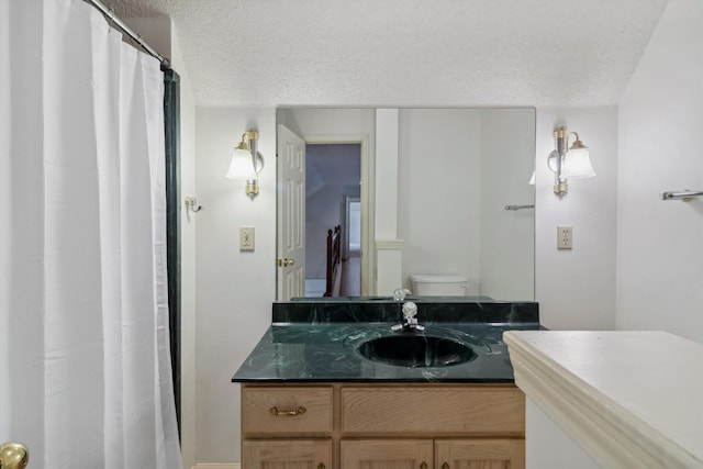 3187 Valley Lake Dr, Bartlett, TN 38135 - bathroom featuring a textured ceiling, toilet, vanity, and a shower with shower curtain