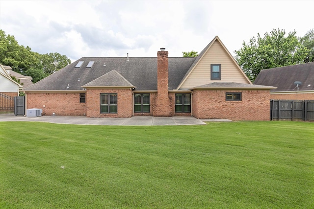 3187 Valley Lake Dr, Bartlett, TN 38135 - rear view of property with a patio, brick siding, a chimney, and a shingled roof