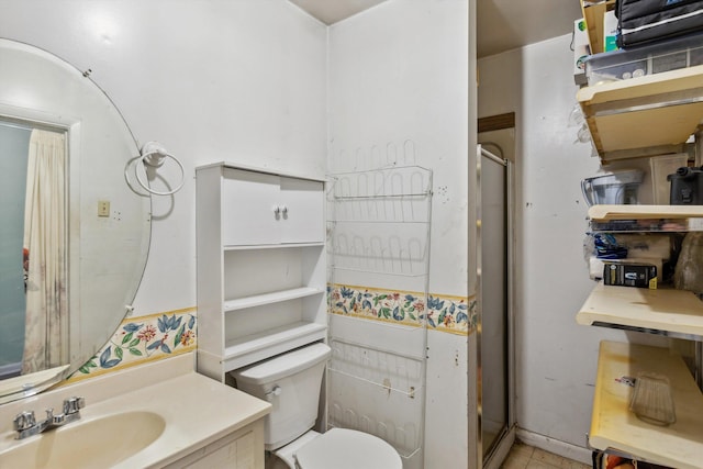 4381 Embassy Dr, Memphis, TN 38108 - full bath featuring toilet, a shower with door, and vanity