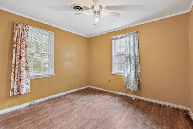 4381 Embassy Dr, Memphis, TN 38108 - spare room with wood-type flooring, crown molding, ceiling fan, and baseboards