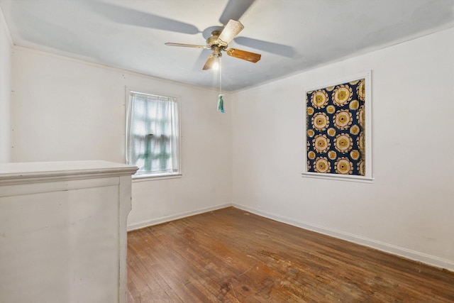 4381 Embassy Dr, Memphis, TN 38108 - empty room with hardwood / wood-style flooring, a ceiling fan, and baseboards