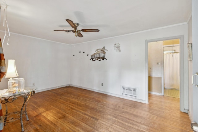 4381 Embassy Dr, Memphis, TN 38108 - unfurnished room with ceiling fan, wood finished floors, baseboards, and crown molding