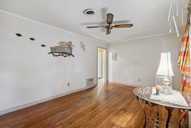 4381 Embassy Dr, Memphis, TN 38108 - spare room with a ceiling fan, wood-type flooring, baseboards, and ornamental molding
