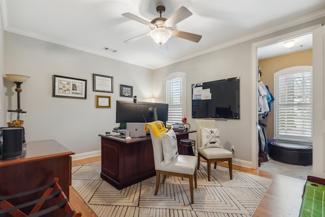 215 Ivy Grove Ln, Collierville, TN 38017 - home office featuring light wood finished floors, crown molding, a ceiling fan, and baseboards