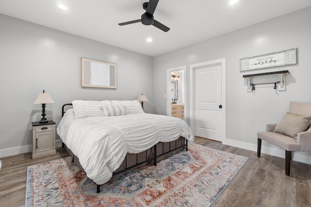 bedroom featuring baseboards, wood finished floors, recessed lighting, and ceiling fan